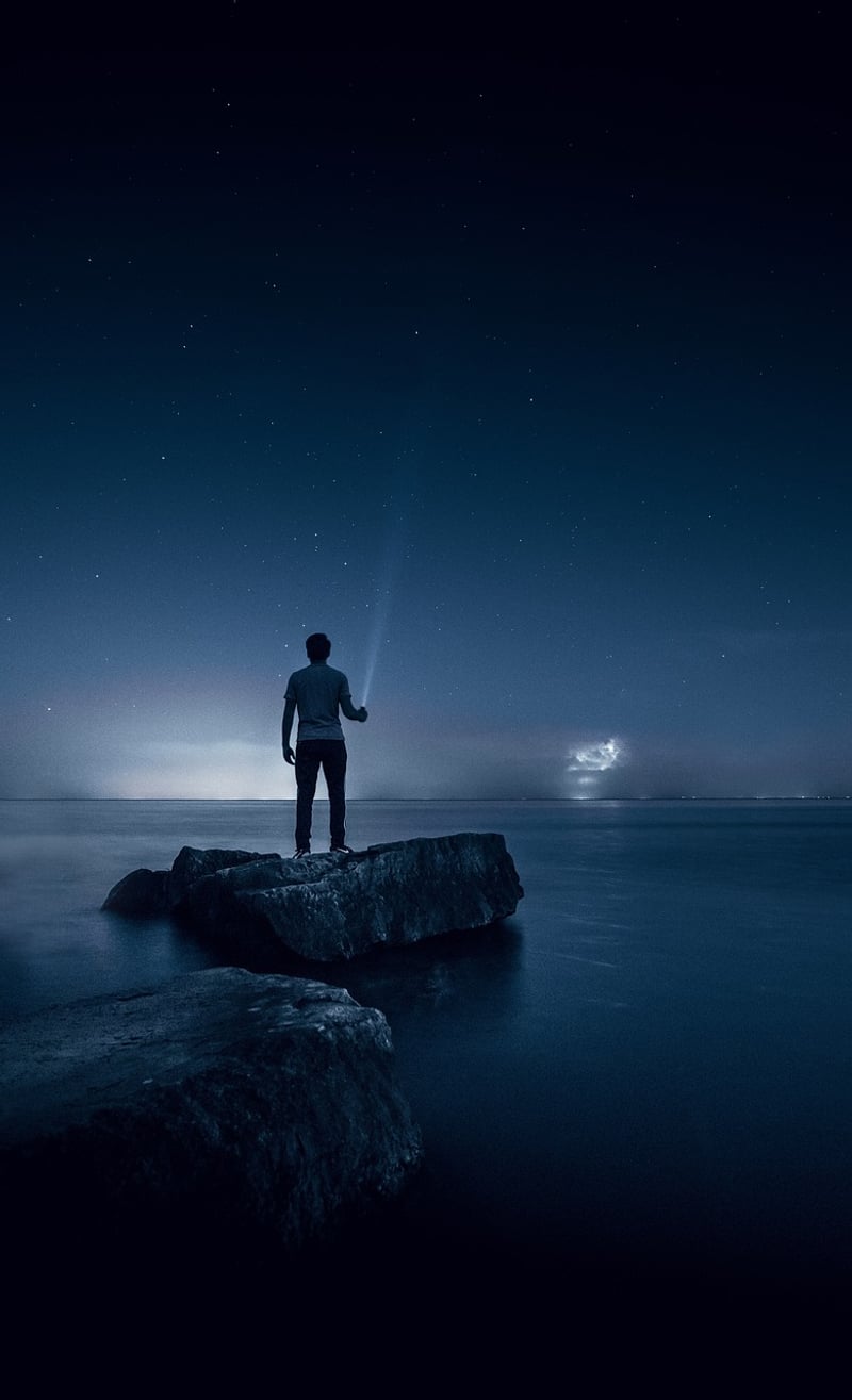 Man meditating and practicing diaphragmatic breathing